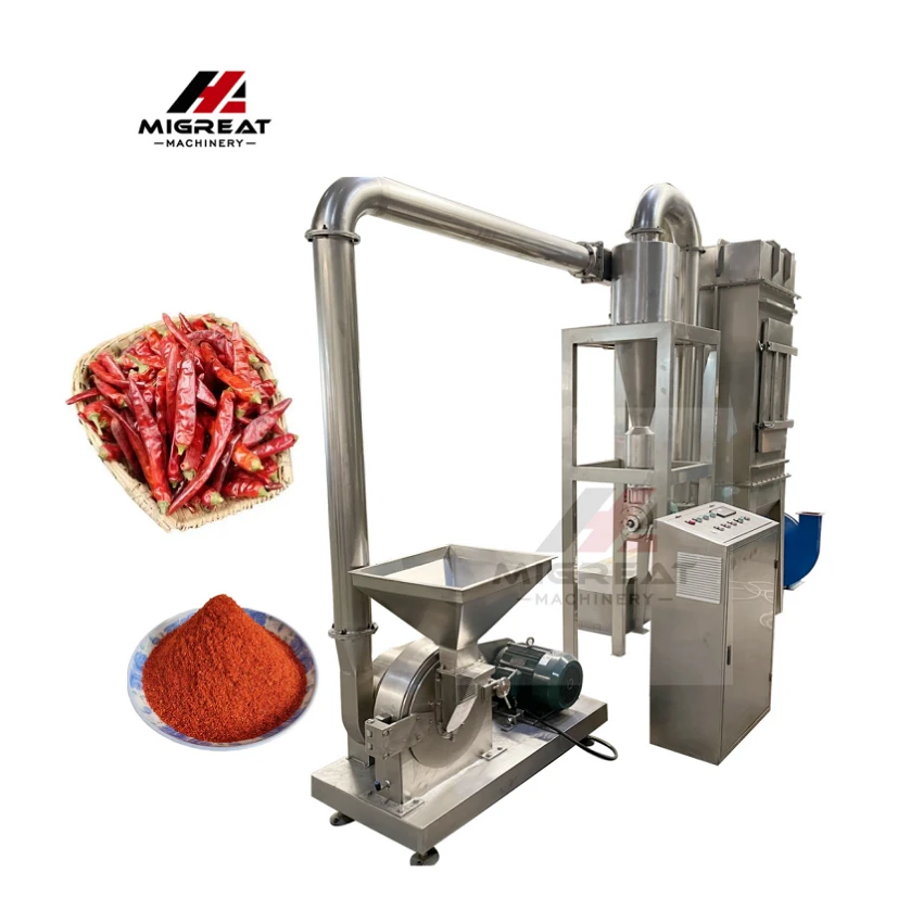 Curcuma in polvere peperoncino aglio macina mulino macinazione